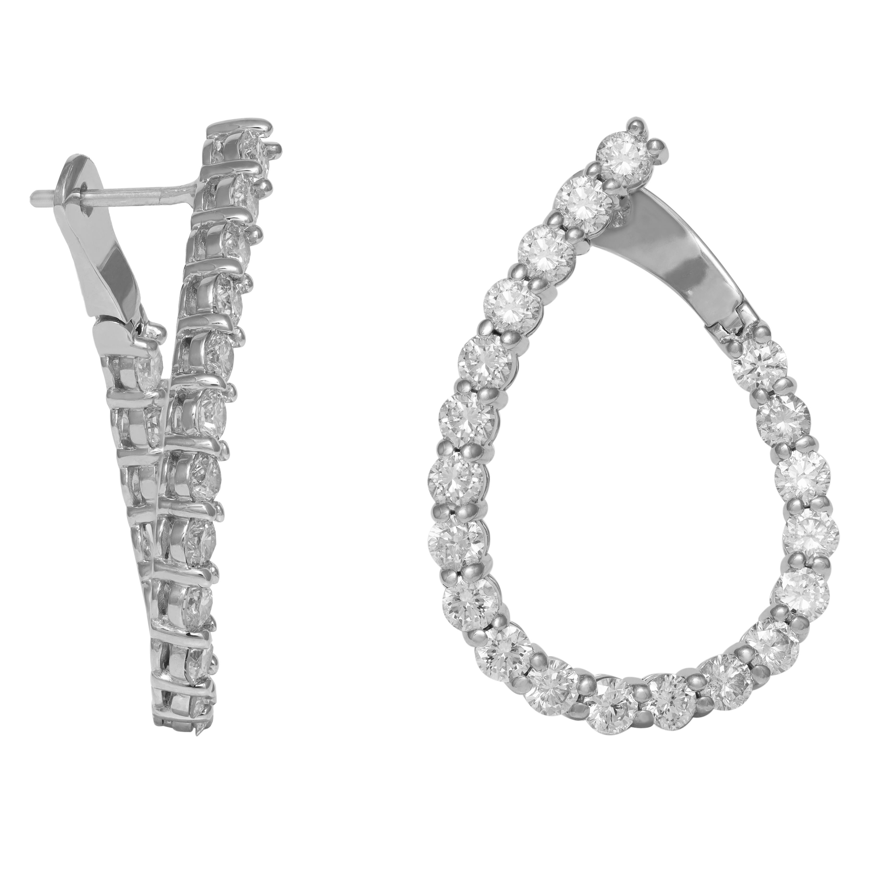 Round Cut Diana M. 14kt white gold fashion earrings featuring 3.60 cts tw of round diamond For Sale