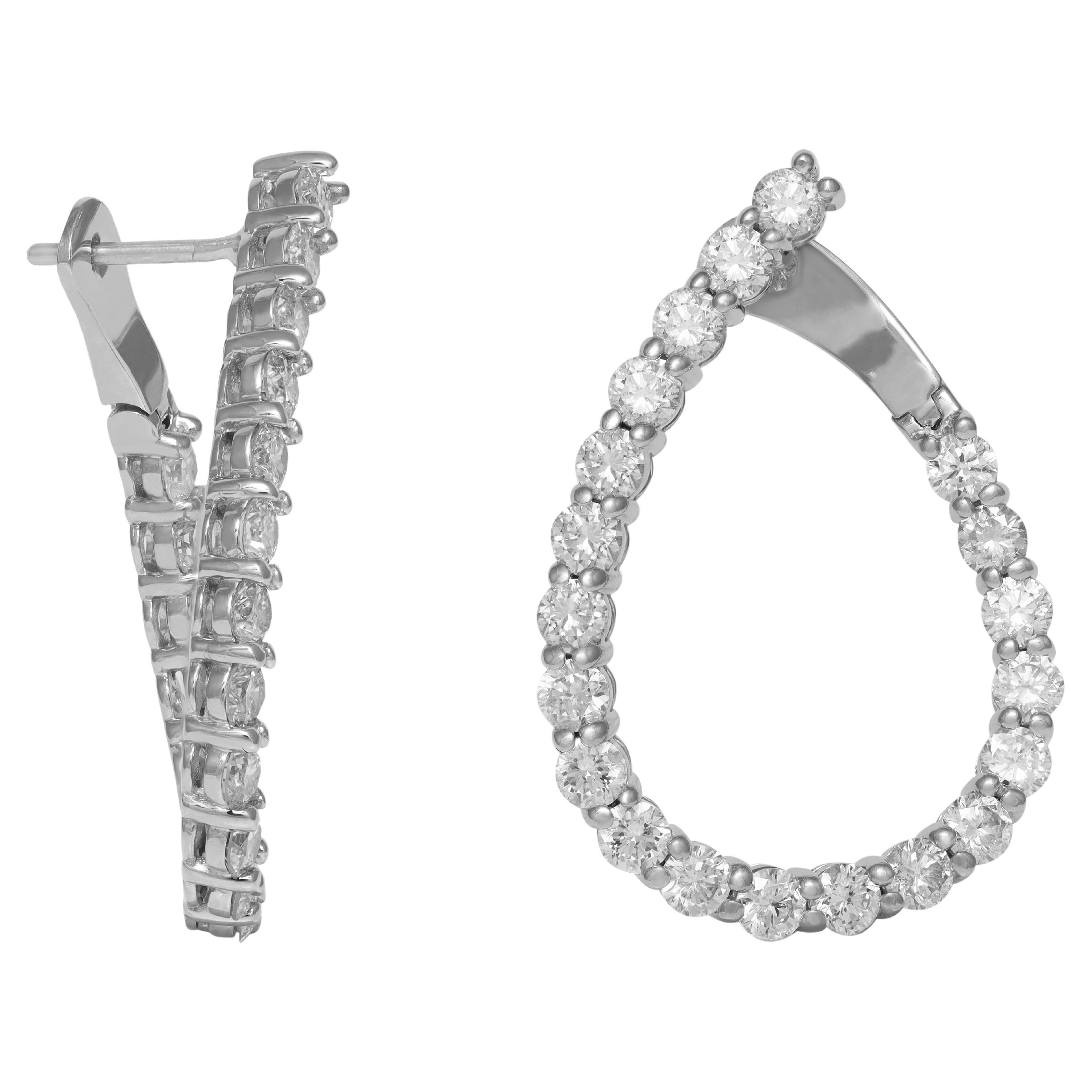 Diana M. 14kt white gold fashion earrings featuring 3.60 cts tw of round diamond For Sale