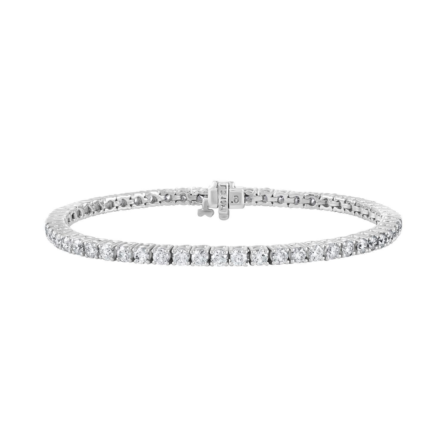 Round Cut Diana M. 14kt white gold tennis bracelet featuring 2.00 cts tw of round diamonds For Sale