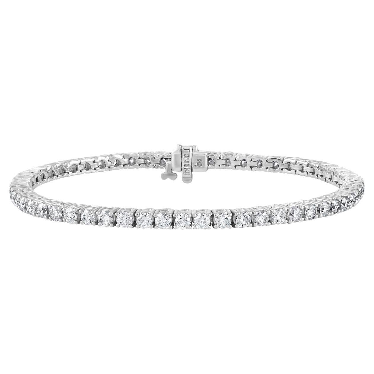 Diana M. 14kt white gold tennis bracelet featuring 2.00 cts tw of round diamonds For Sale