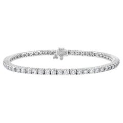 Diana M. 14kt white gold tennis bracelet featuring 2.00 cts tw of round diamonds