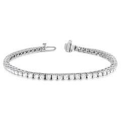 DIANA M. 14kt white gold tennis bracelet featuring 3.00 cts tw of round diamonds