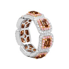 Diana M. 18 kt White and Rose Gold Diamond Eternity Band Containing 4.39 cts