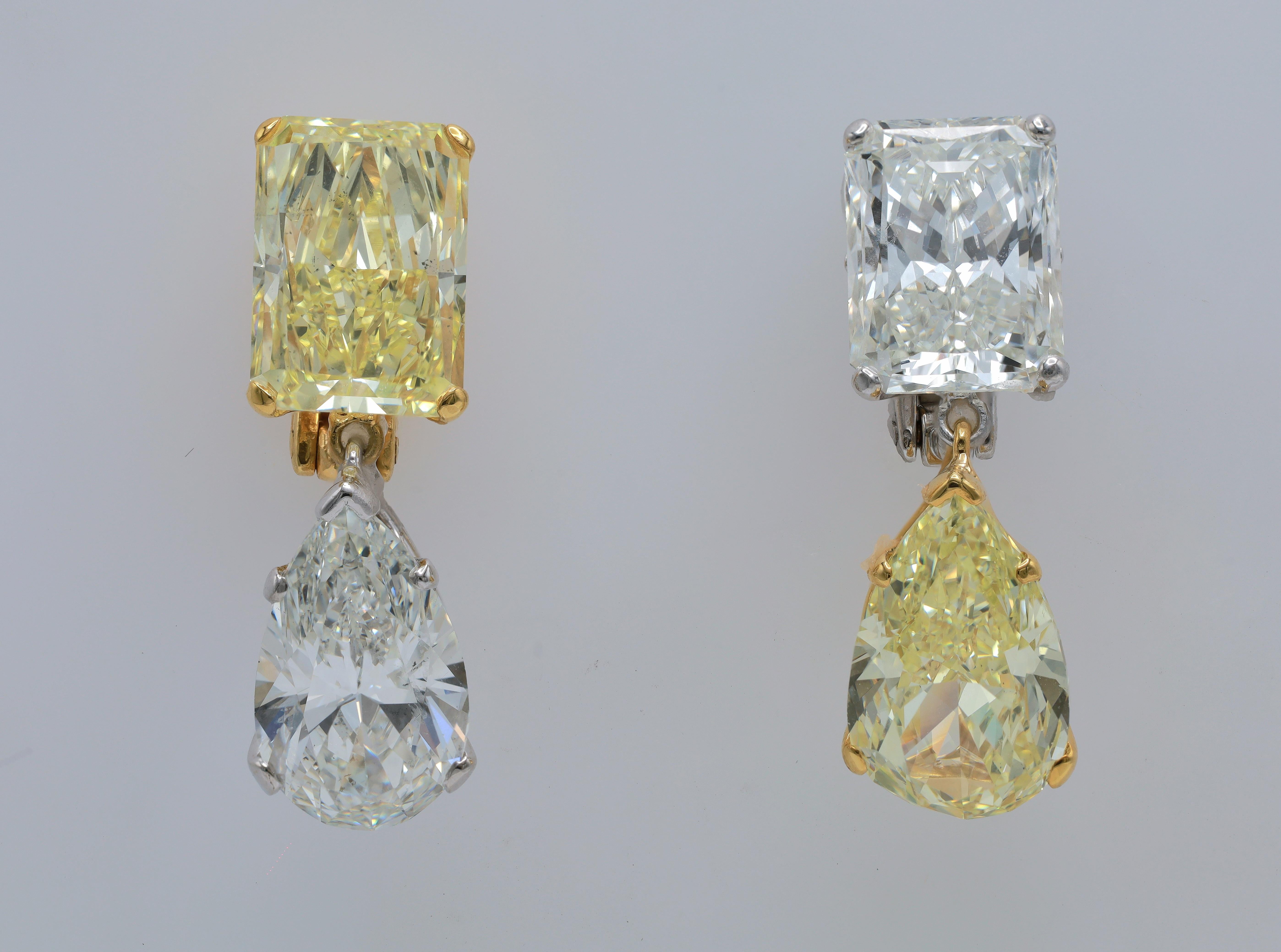 18 kt white and yellow gold drop earrings featuring a 5.22 ct radiant cut white diamond (I-VS2) and a 5.08 ct (I-SI1) pear shaped diamond hanging from it and a second earring with a 5.04 ct fancy yellow VS2 diamond and a 6.06 ct Fancy Yellow SI1