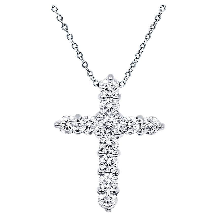 Diana M. 18 kt white gold, 0.75" diamond cross pendant adorned with 0.70 cts tw 