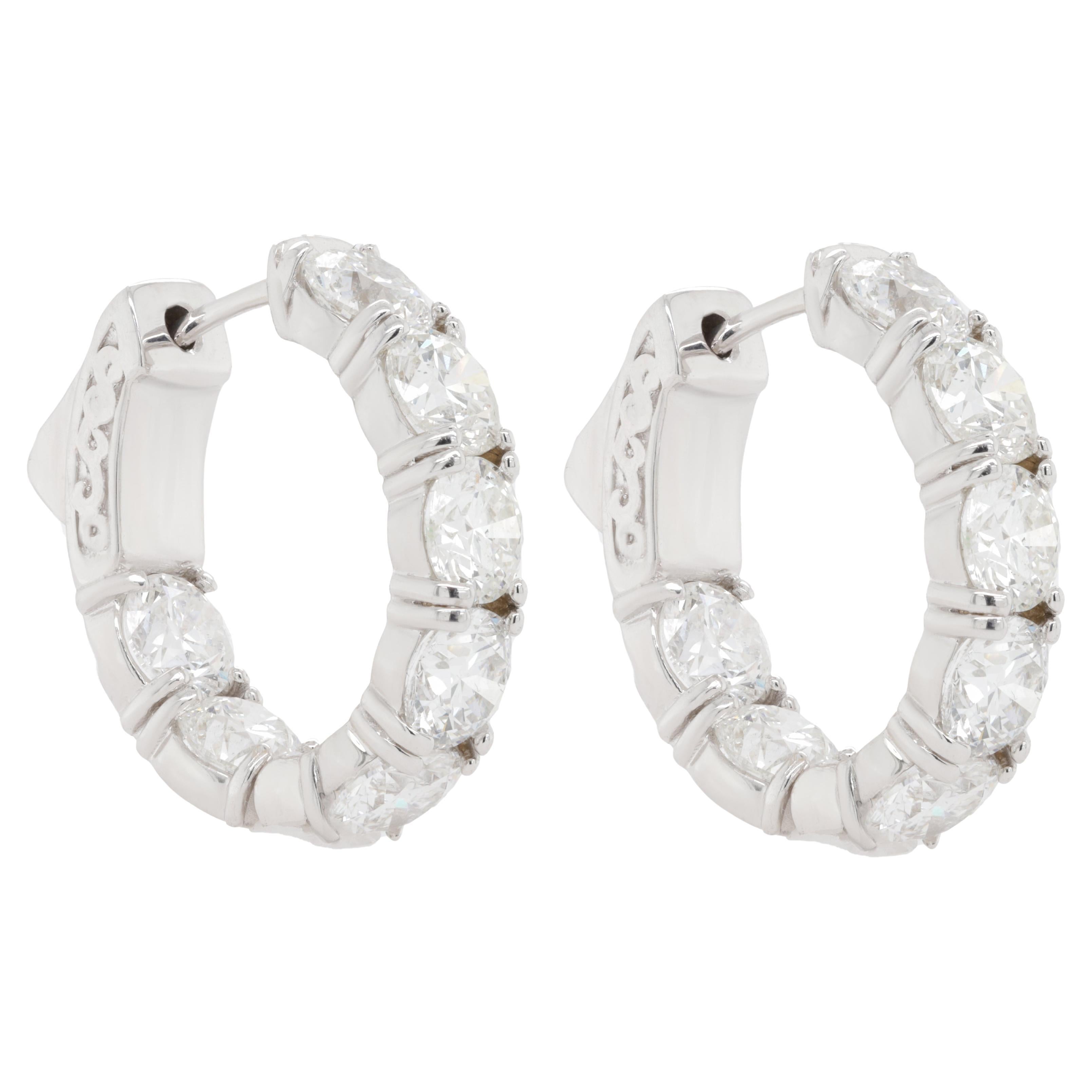 Diana M. 18 kt white gold, 0.75" inside-out hoop earrings adorned with 7.30 cts  For Sale