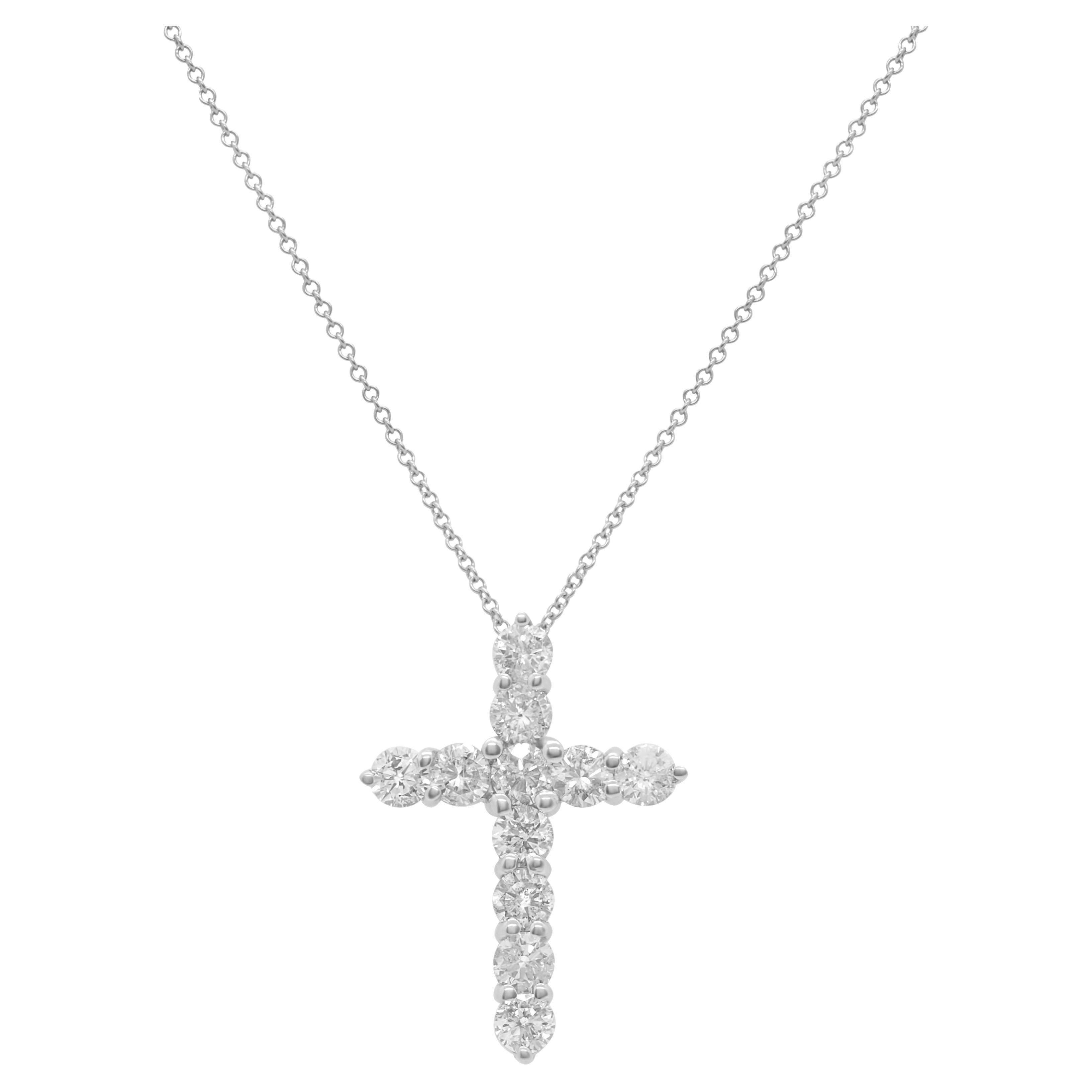 Diana M. 18 kt white gold, 0.75" diamond cross pendant adorned with 0.70 cts tw