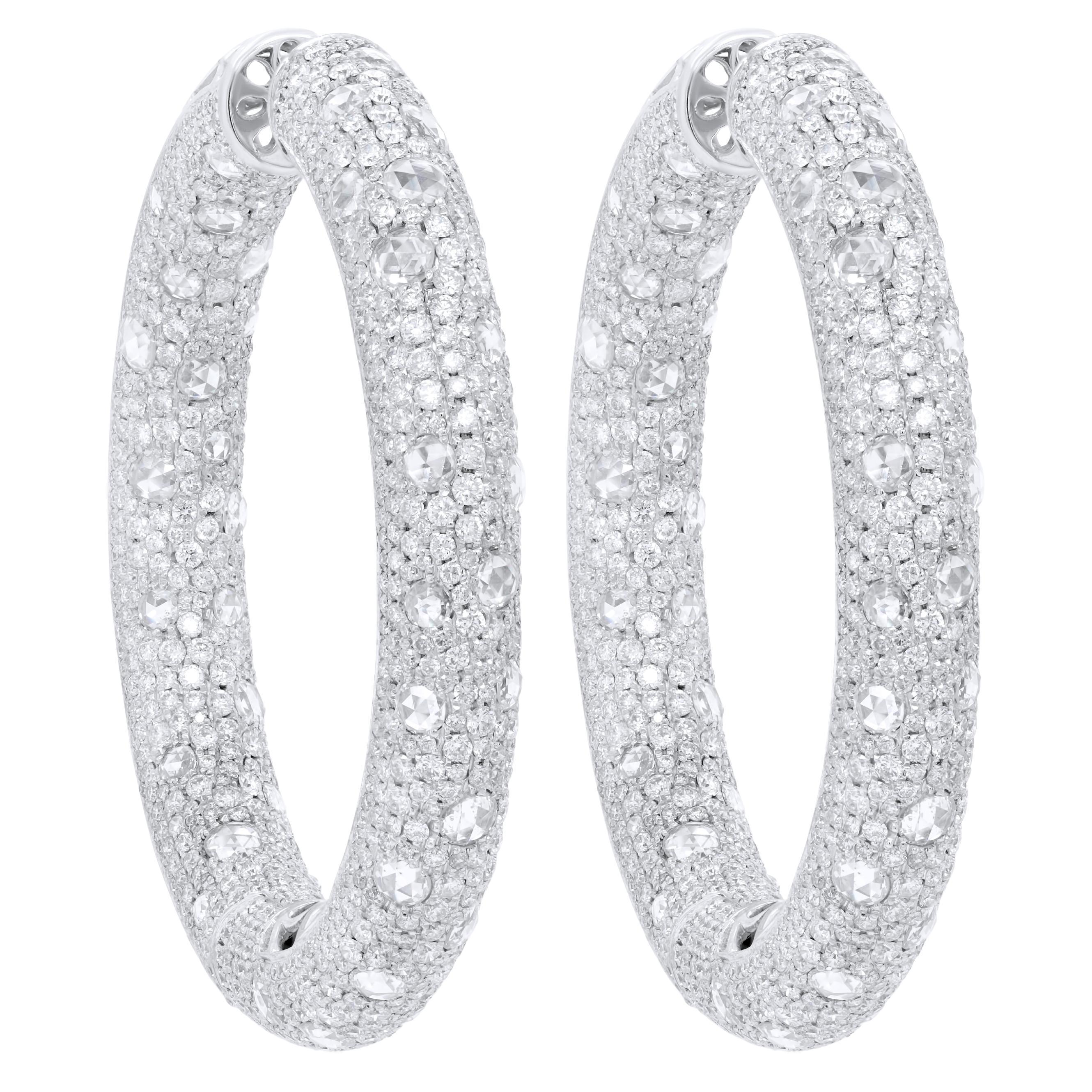 Diana M. 18 kt white gold, 2.25" inside-out hoop earrings adorned with 27.52cts 