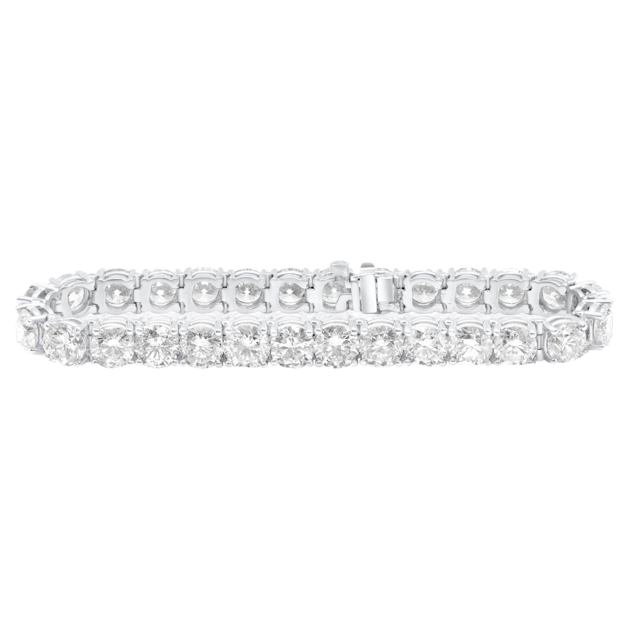Diana M. 18 kt white gold 4 prong diamond tennis bracelet adorned with 14.20 cts For Sale