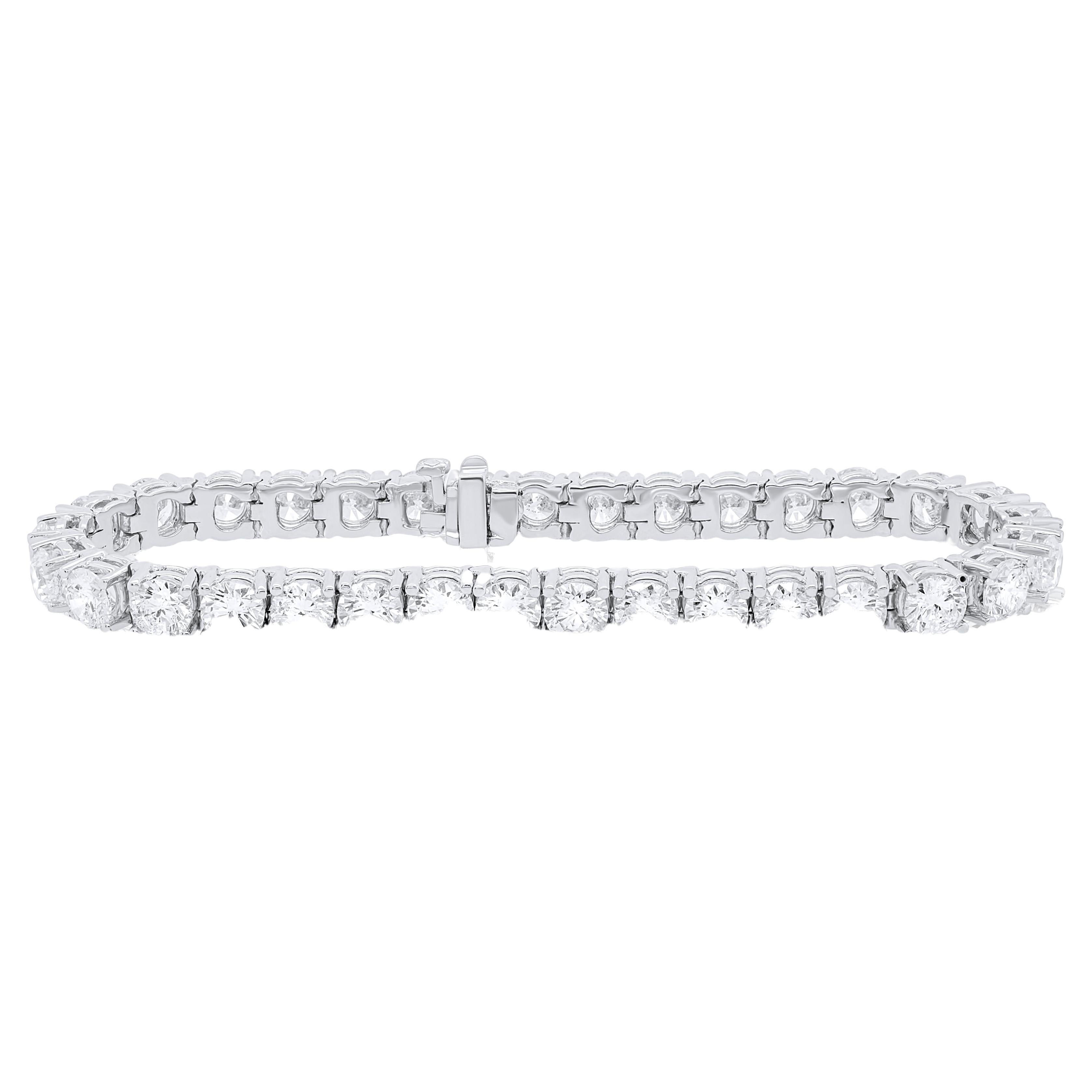 Custom 18 kt white gold 4 prong diamond tennis bracelet with 14.55 cts brilliant-cut round diamonds  0.40 each 36 stones. FG Color. SI Clarity. Excellent Cut.

