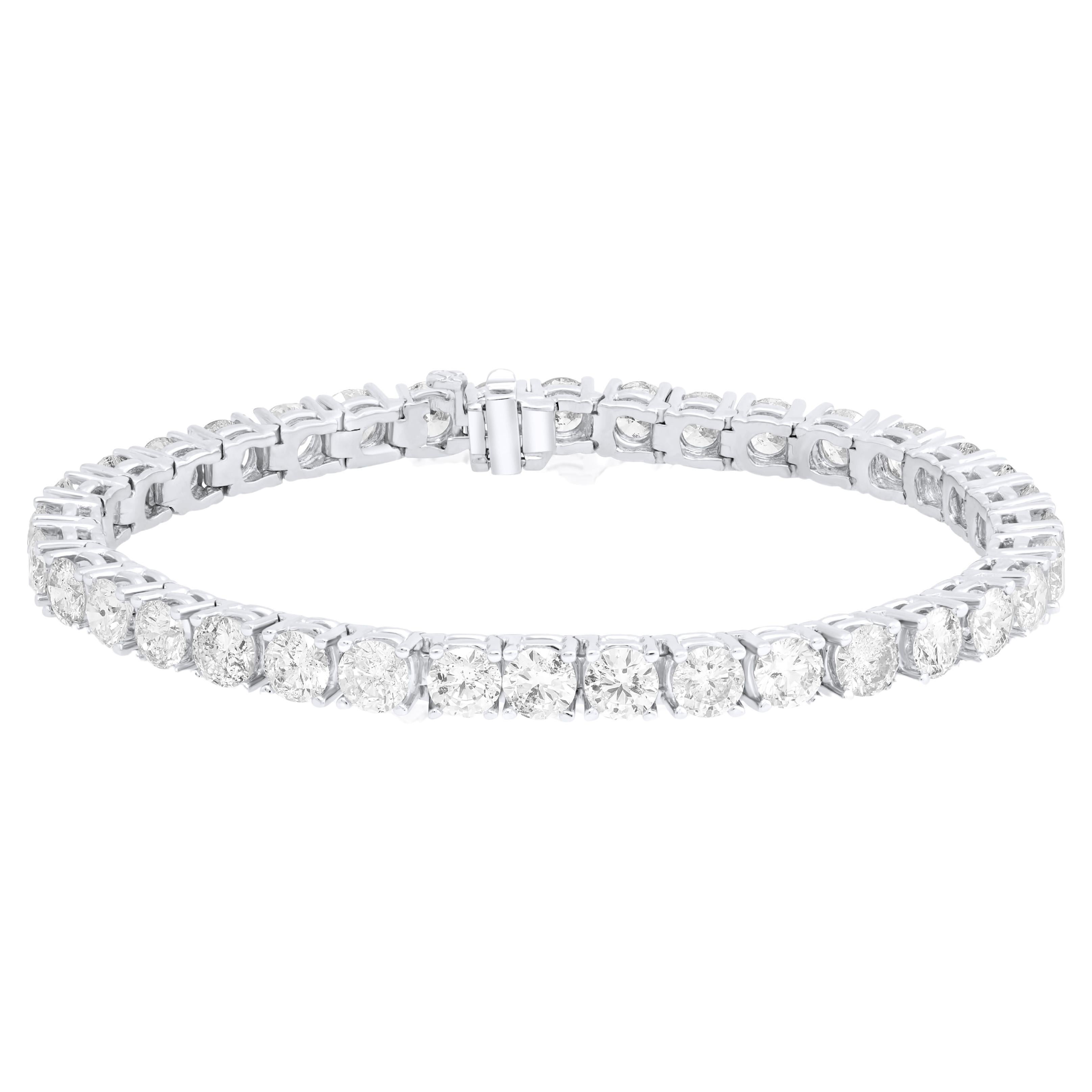 Diana M. 18 kt white gold 4 prong diamond tennis bracelet adorned with 15.85 cts For Sale