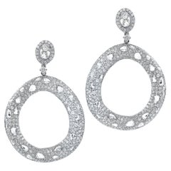 Diana M, 18 kt white gold circle diamond earrings containing 9.61 cts tw 