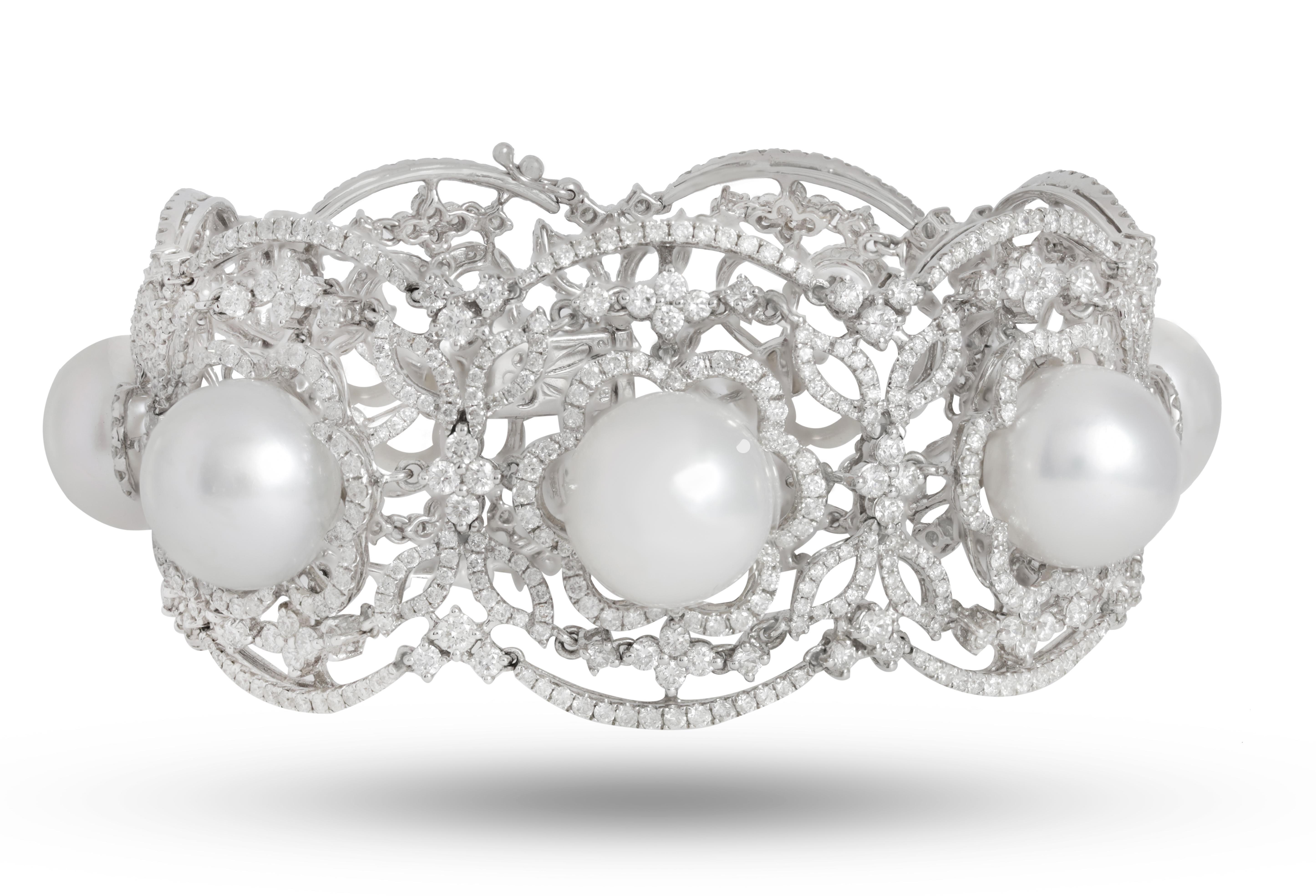 Pear Cut Diana M. 18 kt white gold diamond and pearl fashion bracelet adorned with 13.5  For Sale