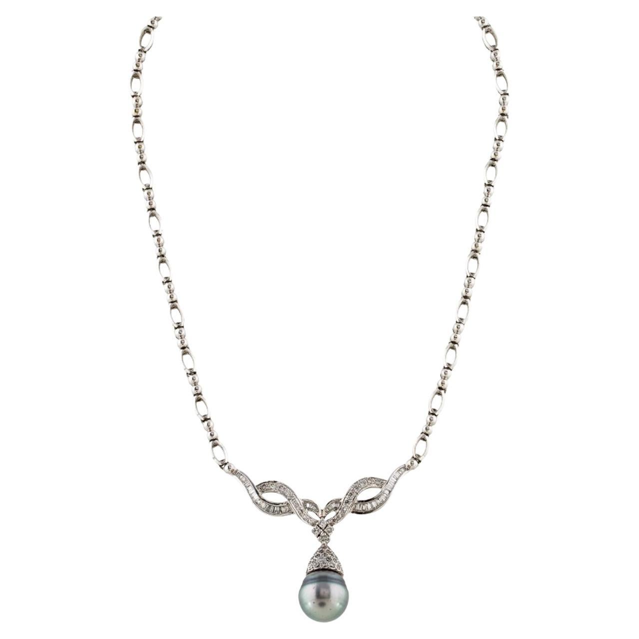 Diana M. 18 kt white gold diamond and pearl necklace featuring a center 14.00mm For Sale