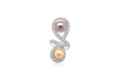 Diana M. 18 kt white gold diamond and pearl ring featuring a yellow and a black