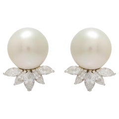 Diana M. 18 kt white gold diamond and pearl stud earrings featuring a 14 mm 