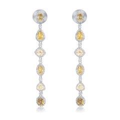 Diana M. 18 kt White Gold Diamond Earrings Adorned with 7.30 cts tw