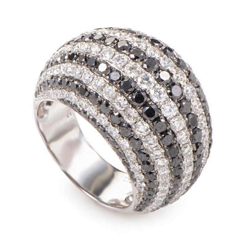 18 kt white gold diamond fashion dome pave ring containing alternating rows of white and black diamonds totaling 7.00 cts.
Diana M. is a leading supplier of top-quality fine jewelry for over 35 years.
Diana M is one-stop shop for all your jewelry