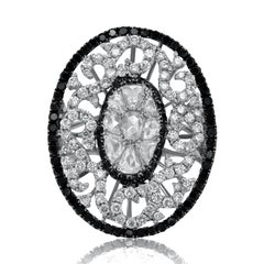 Diana M. 18 kt White Gold Diamond Fashion Ring With A Center Piece Surrounded