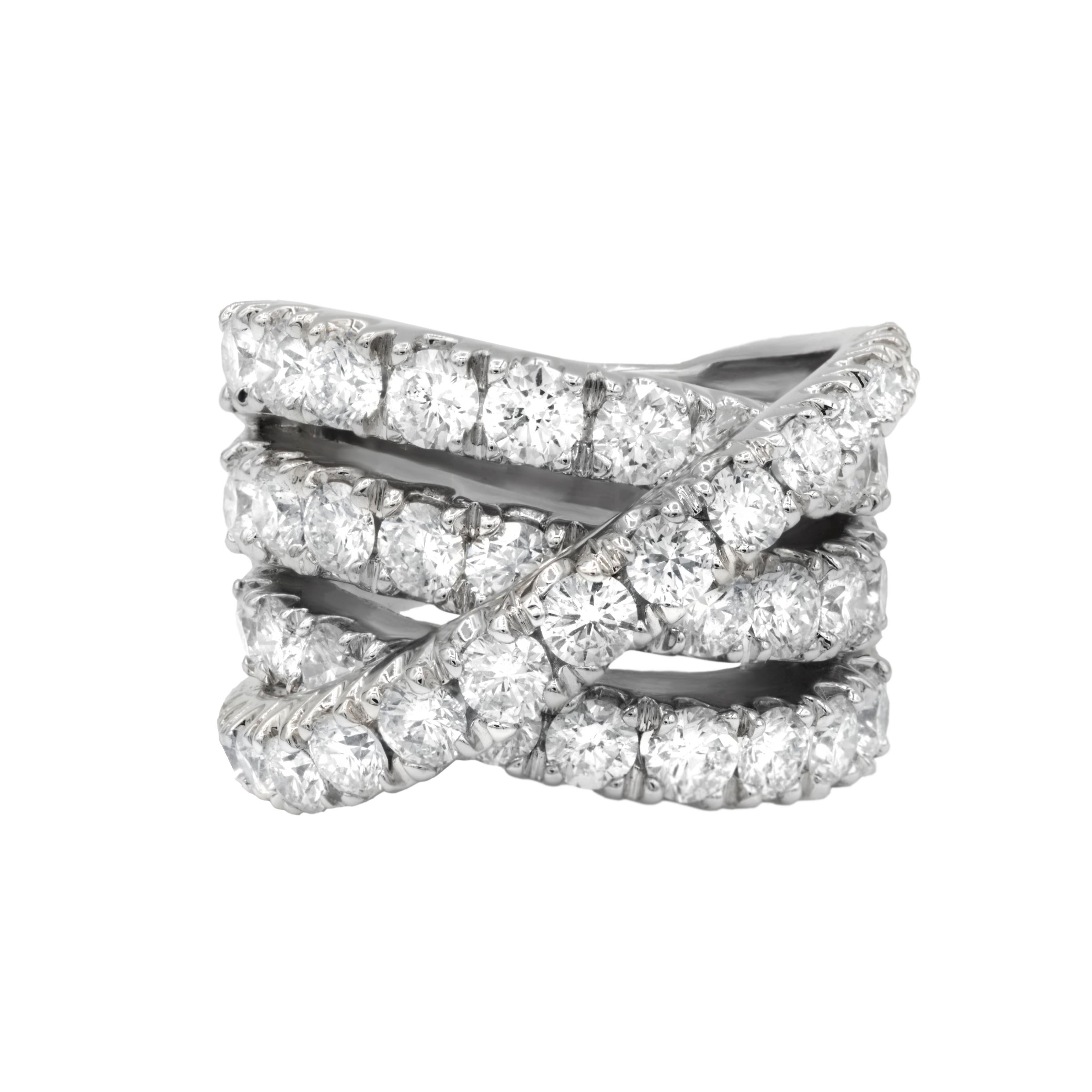 18 kt white gold diamond ring with a 3 row crossed spiral design containing 7.50 cts tw of diamonds.
Diana M. is a leading supplier of top-quality fine jewelry for over 35 years.
Diana M is one-stop shop for all your jewelry shopping, carrying line