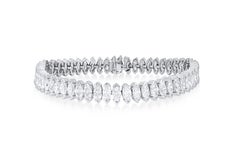 Diana M.  18 kt white gold diamond tennis bracelet adorned with 12.32 cts tw