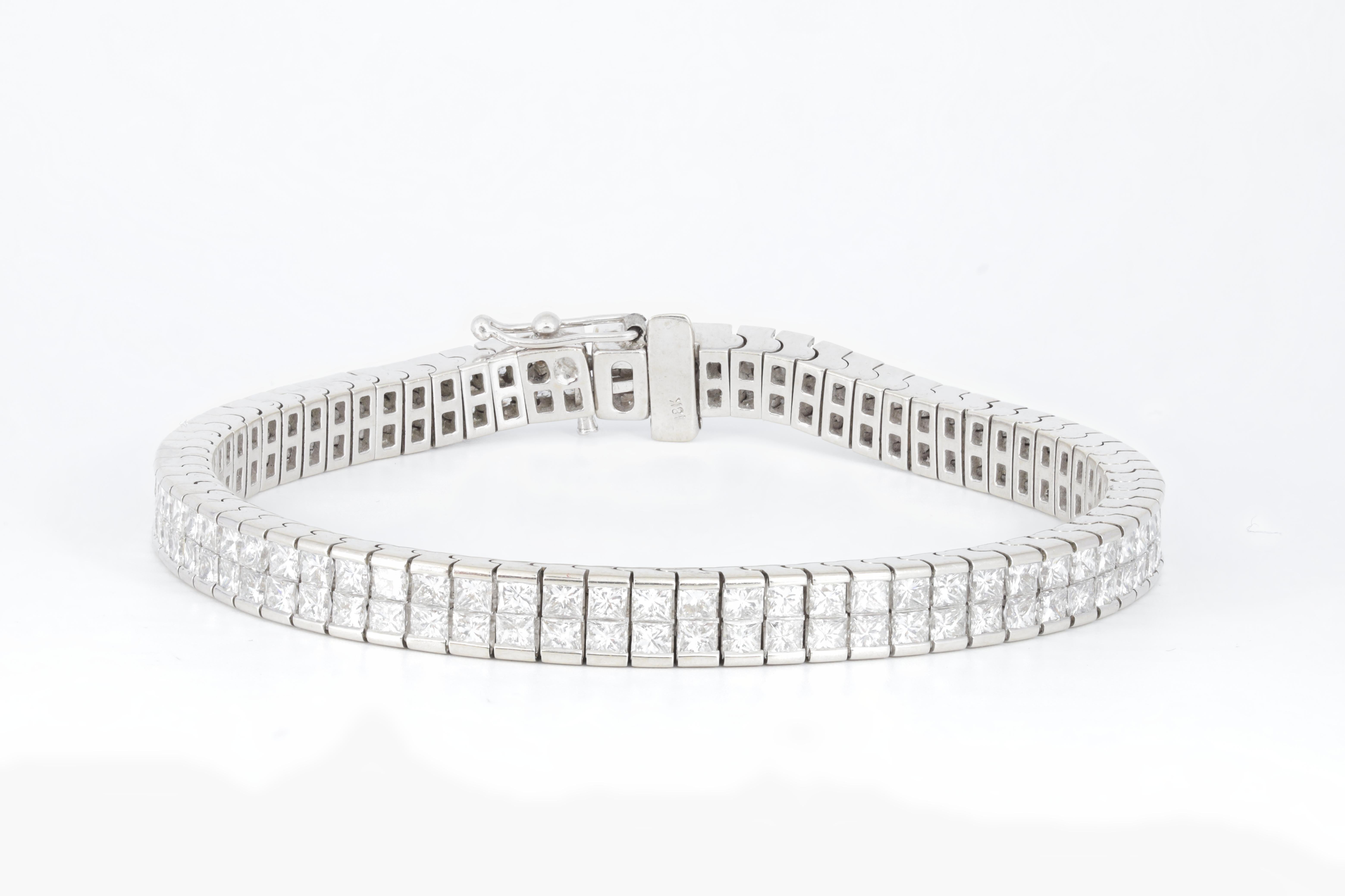 18 kt white gold diamond tennis bracelet adorned with 2 rows of 12.30 cts tw of channel set princess cut diamonds (148 stones)
Diana M. is a leading supplier of top-quality fine jewelry for over 35 years.
Diana M is one-stop shop for all your