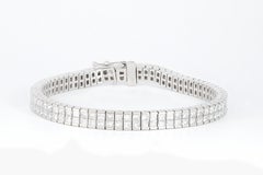 Diana M. 18 kt white gold diamond tennis bracelet adorned with 2 rows of 12.30