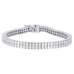 Diana M. 18 kt white gold diamond tennis bracelet adorned with 2 rows of 12.30 