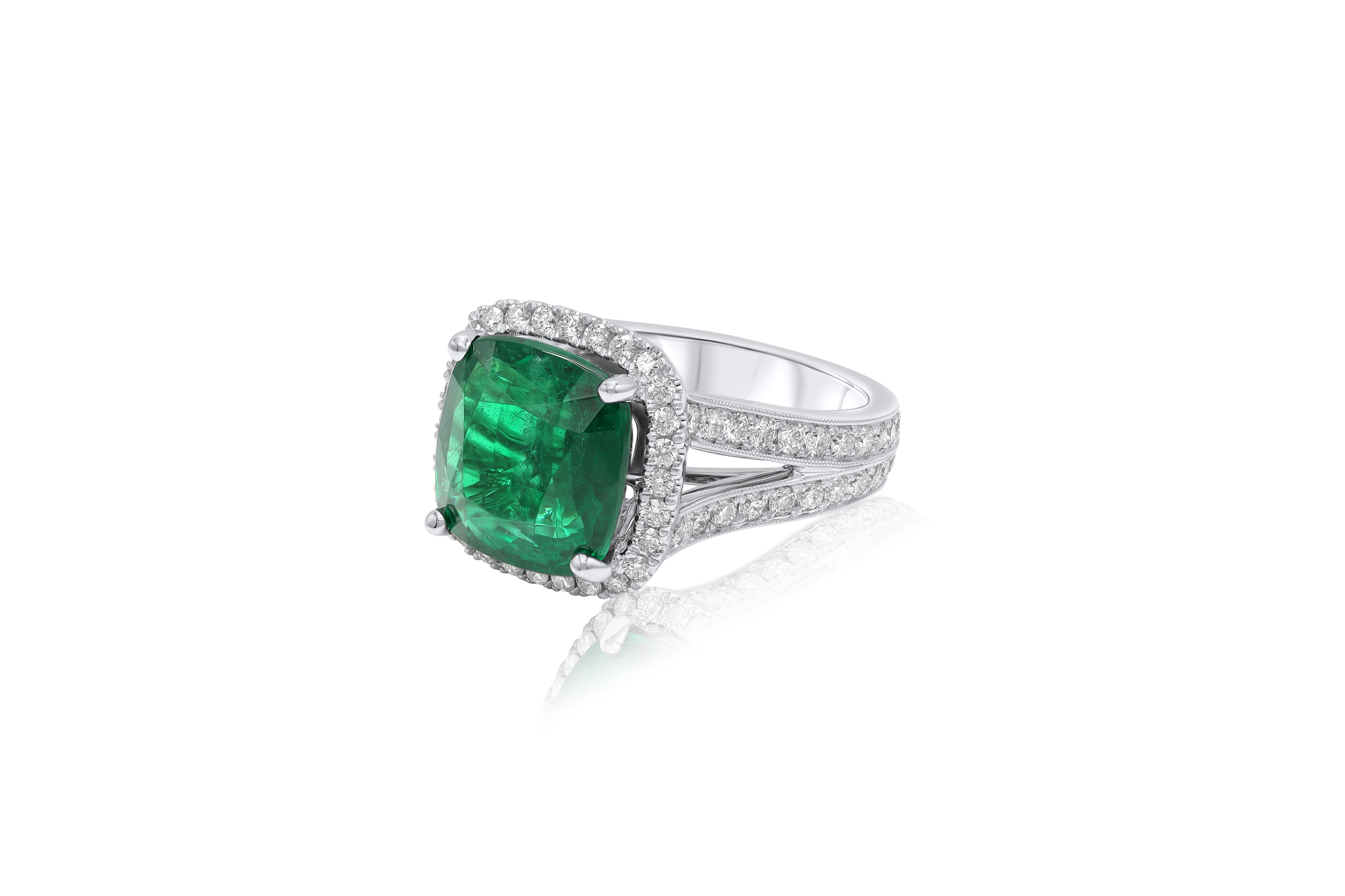 Modern Diana M. 18 kt white gold emerald diamond ring featuring a 6.63 ct  For Sale