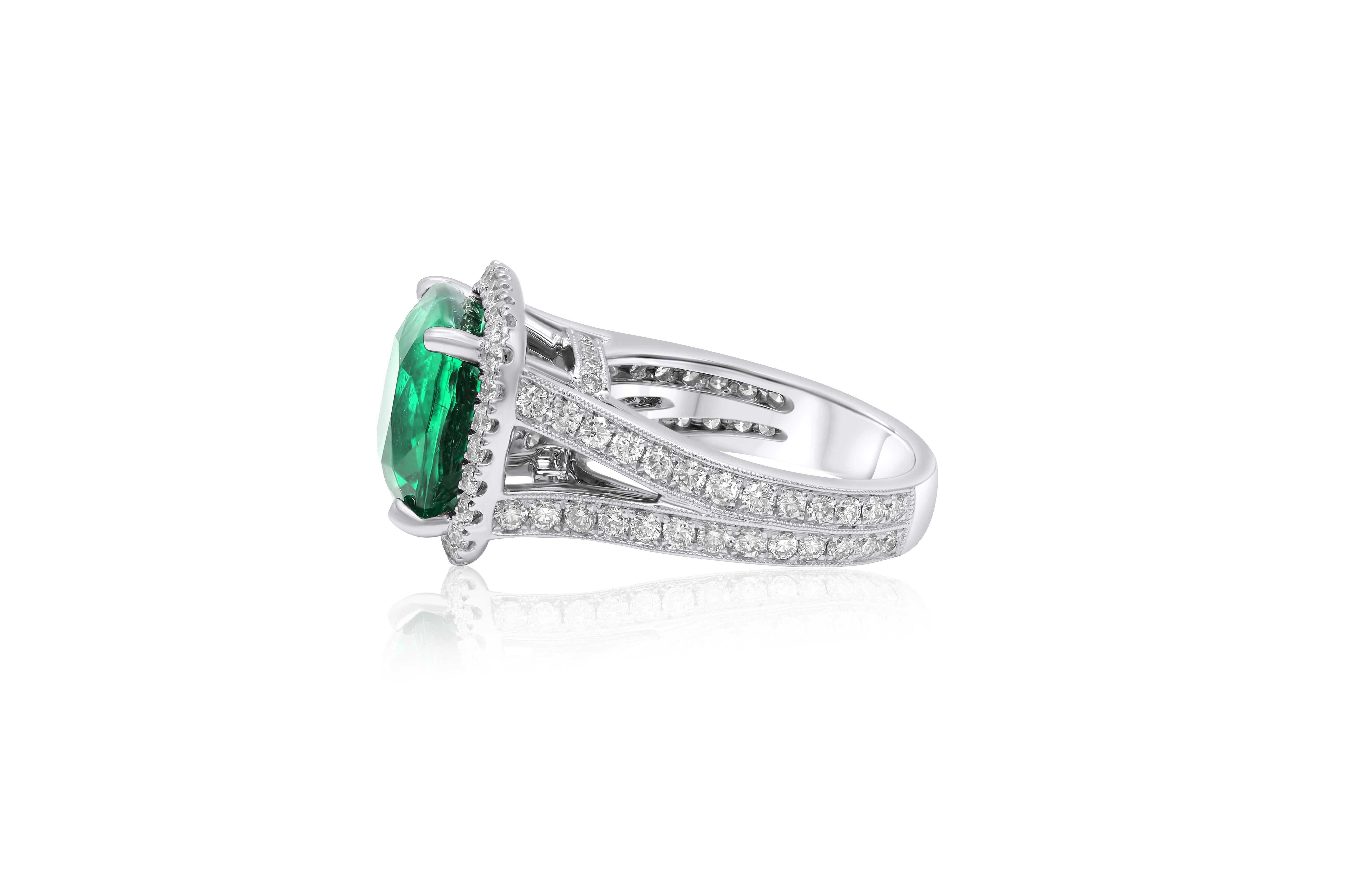 Emerald Cut Diana M. 18 kt white gold emerald diamond ring featuring a 6.63 ct  For Sale