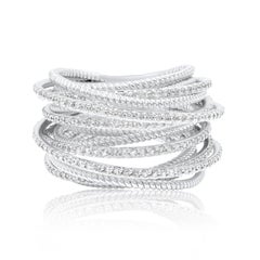 Diana M. 18 kt white gold fashion interlocking spiral ring adorned with 1.40 cts