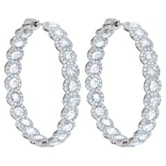 Diana M.  18 kt white gold inside-out hoop earrings with halo design 5.90ct