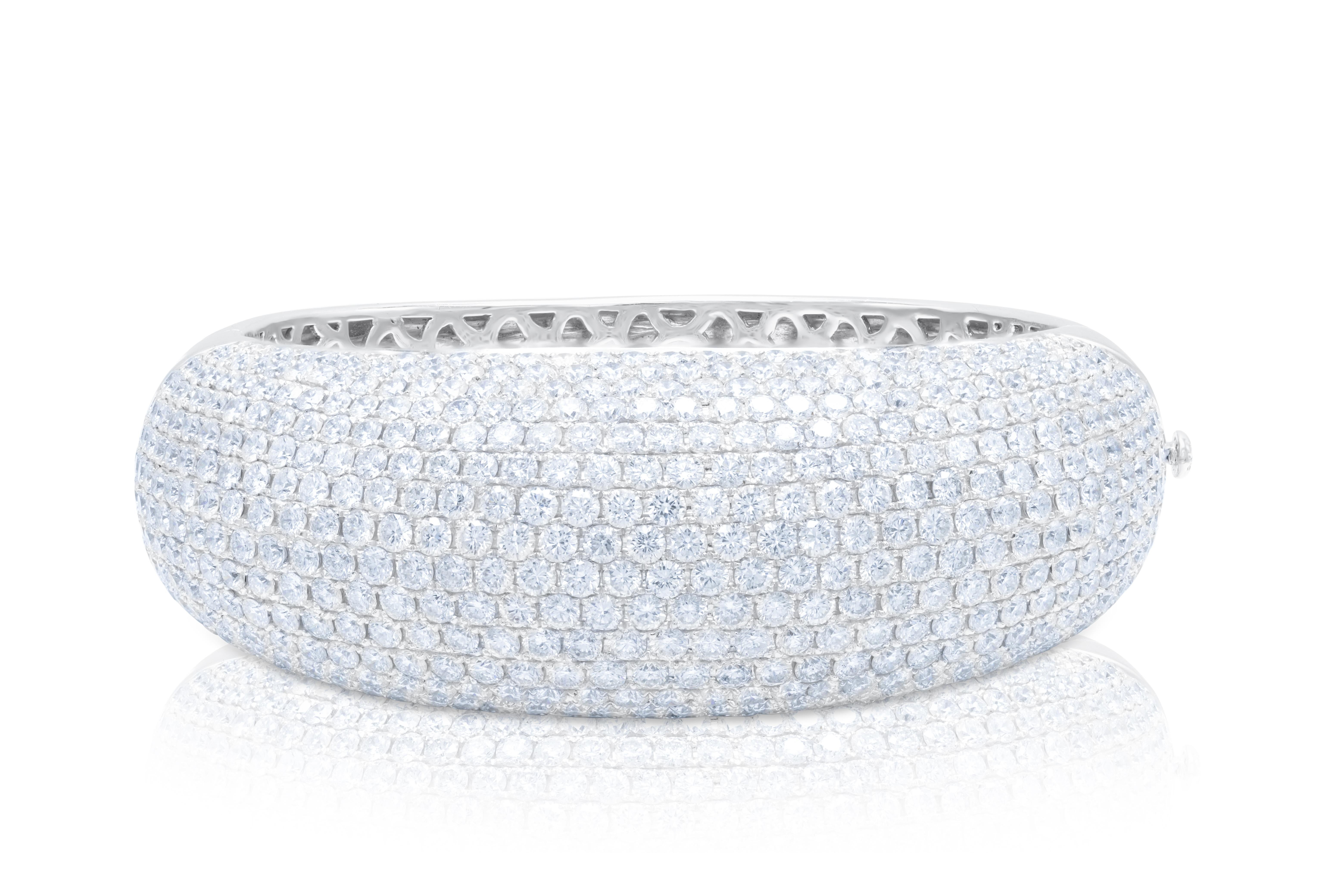 18 kt white gold pave bangle adorned with multiple rows of 35.00 cts tw of diamonds going half-way around
Diana M. is a leading supplier of top-quality fine jewelry for over 35 years.
Diana M is one-stop shop for all your jewelry shopping, carrying