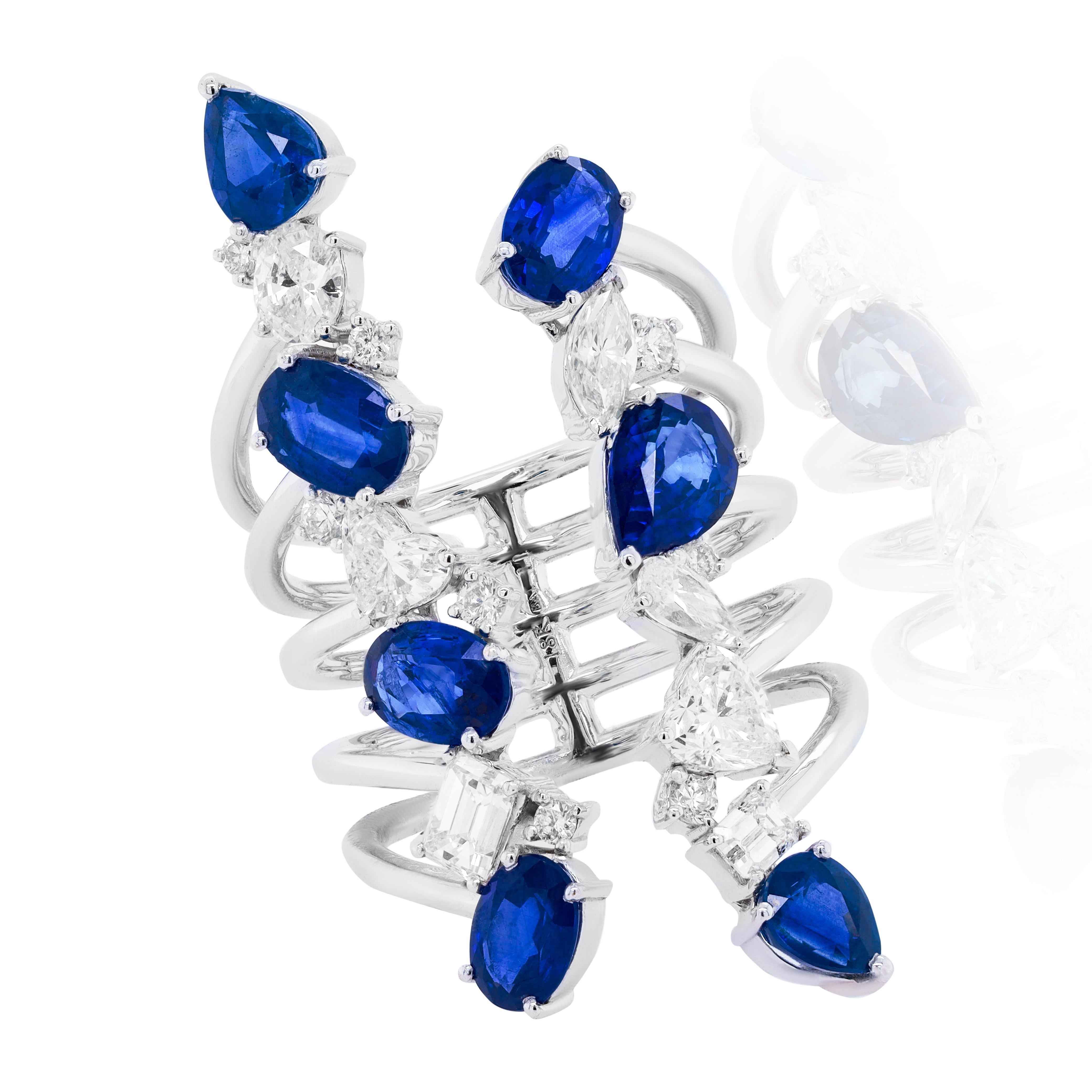 18 kt white gold sapphire and diamond open ring featuring 4.31 cts tw of multishape sapphires and 1.68 cts tw of multishape white diamonds at the ends of 5 different open rows.
Diana M. is a leading supplier of top-quality fine jewelry for over 35