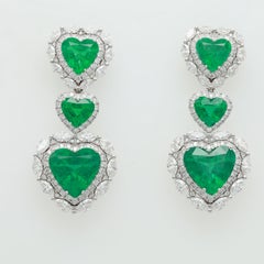 Diana M. 18 kt white gold stud earrings featuring 7.75 cts tw heart
