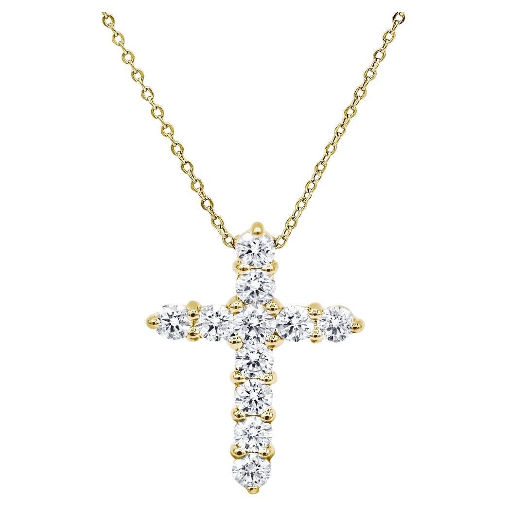 Diana M. 18 kt yellow gold, 0.50" diamond cross pendant adorned with 0.70 cts 