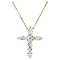 Diana M. Pendentif croix en or jaune 18 carats, diamants de 0,50 carat orné de 0,70 carat 