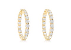 Diana M. 18 kt yellow gold inside-out hoop earrings adorned with 19.05 cts