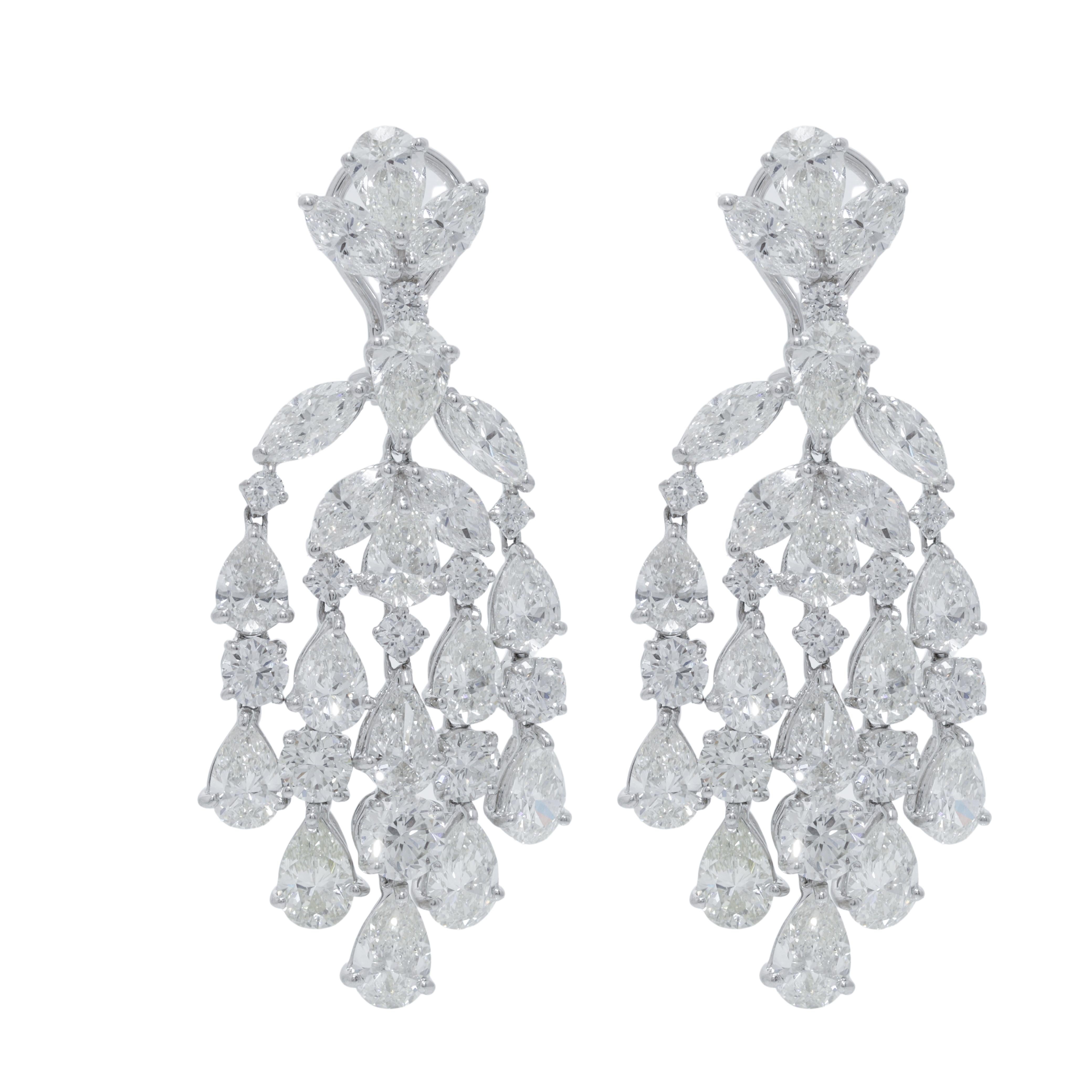 Platinum Chandelier Diamond Earrings, with top diamond cluster and five drops. Features 21.05 Carats of Diamonds. G-H-I in Color VS in Clarity. 
Diana M. is a leading supplier of top-quality fine jewelry for over 35 years.
Diana M is one-stop shop