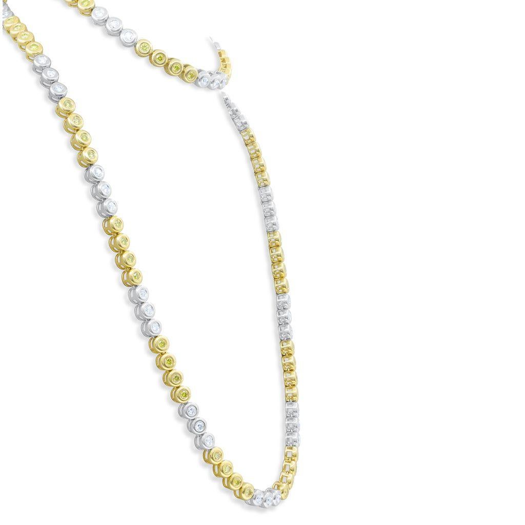 14kt white and yellow gold long necklace featuring 18.00 cts of bezel set yellow and white diamonds