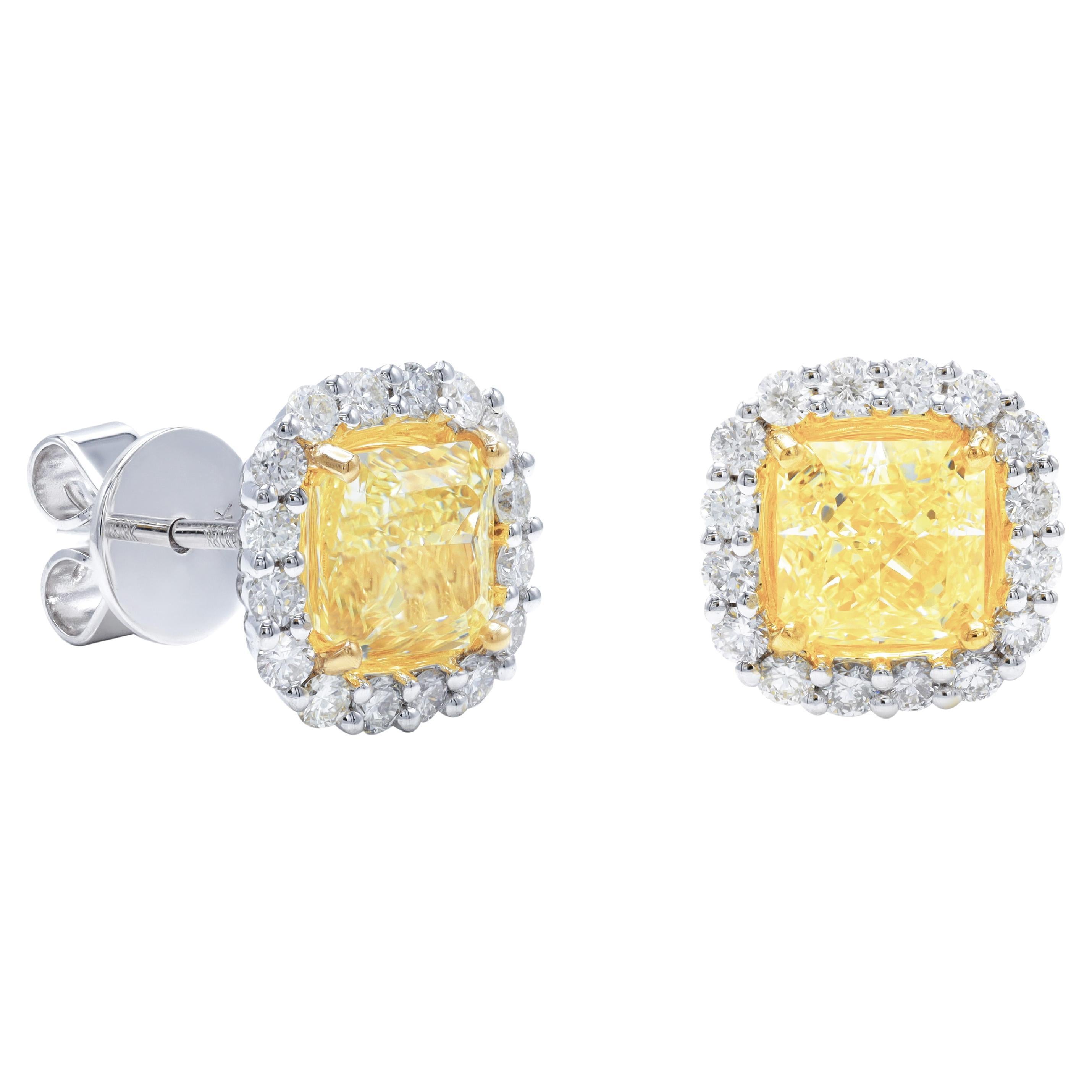 DIANA M. 18kt cushion shape yellow diamond earrings 3.08ct center 1.50ct halo