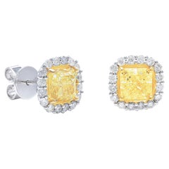 DIANA M. Orecchini con diamanti gialli a forma di cuscino 18kt 3,08ct centro 1,50ct aureola