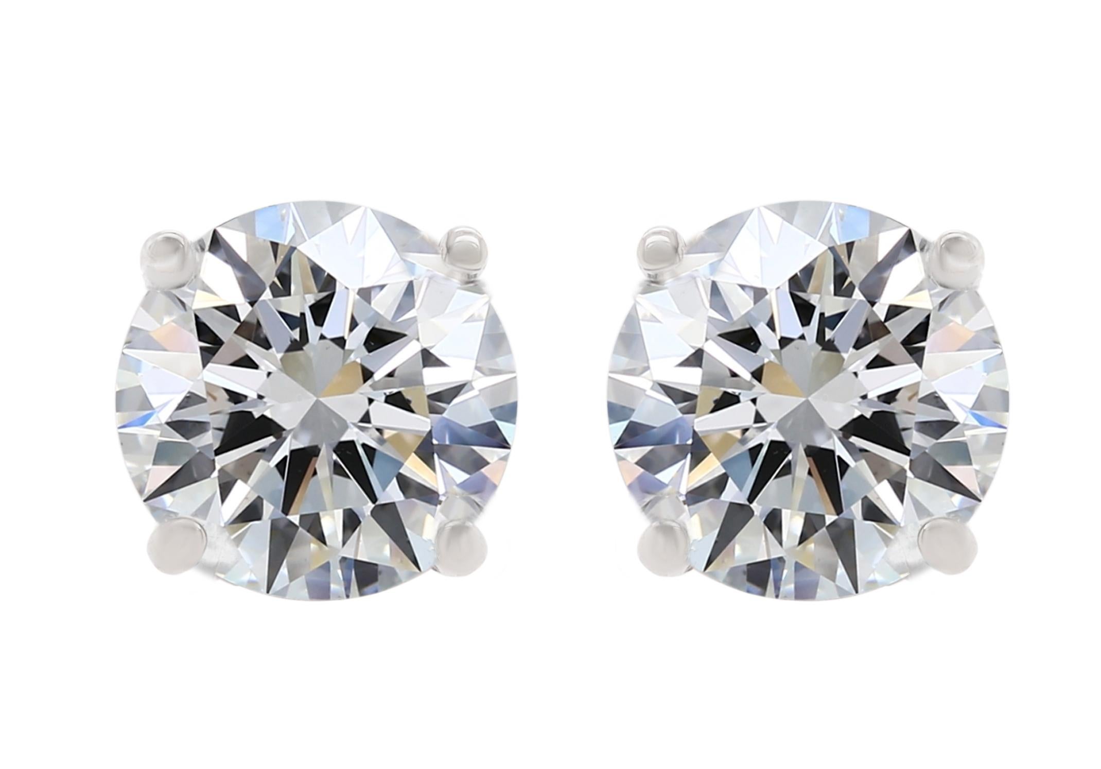 Modern Diana M. 4 Prong Mounting Near Colored White  5.62 Carat Diamond Studs For Sale