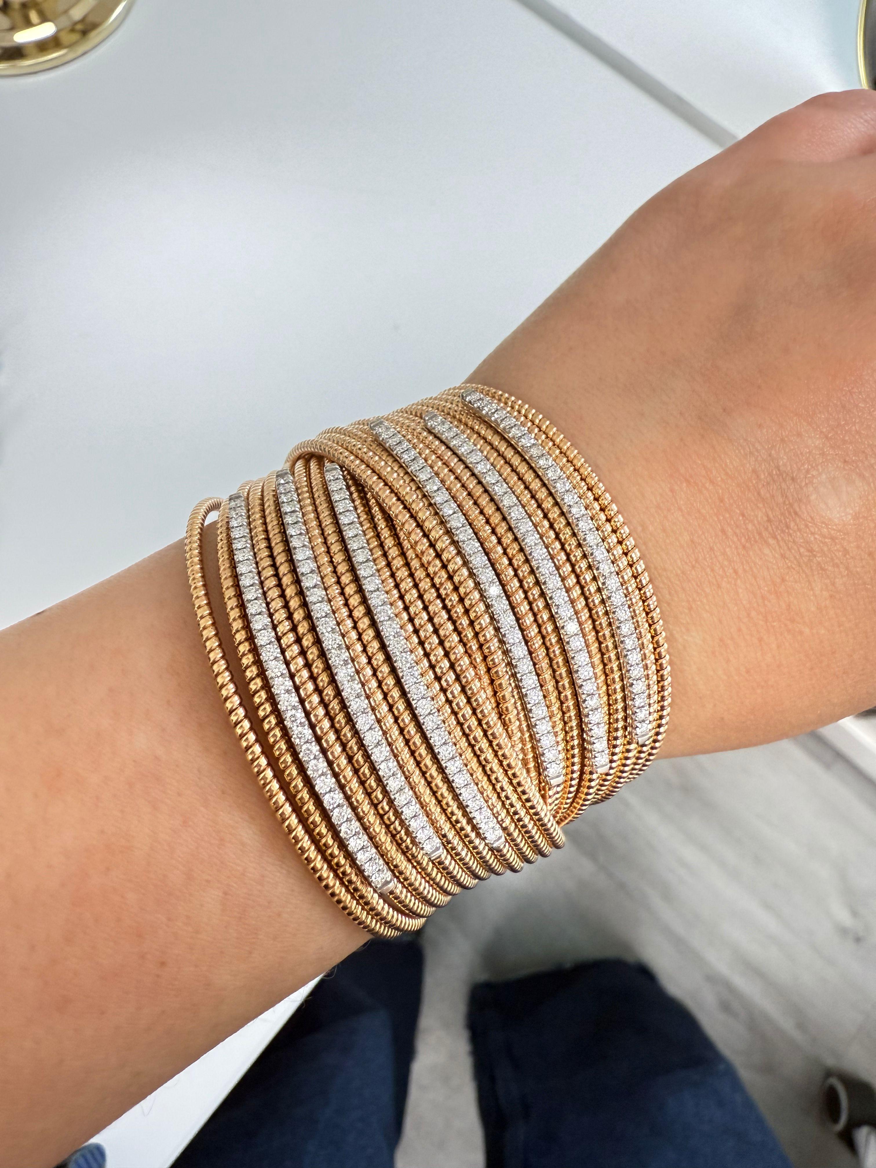 18kt White, Yellow, and Rose Gold 2.58 Carat Round Diamond Wire Cuff Bracelet.

Diana M. is a leading supplier of top-quality fine jewelry for over 35 years.
Diana M is one-stop shop for all your jewelry shopping, carrying line of diamond rings,
