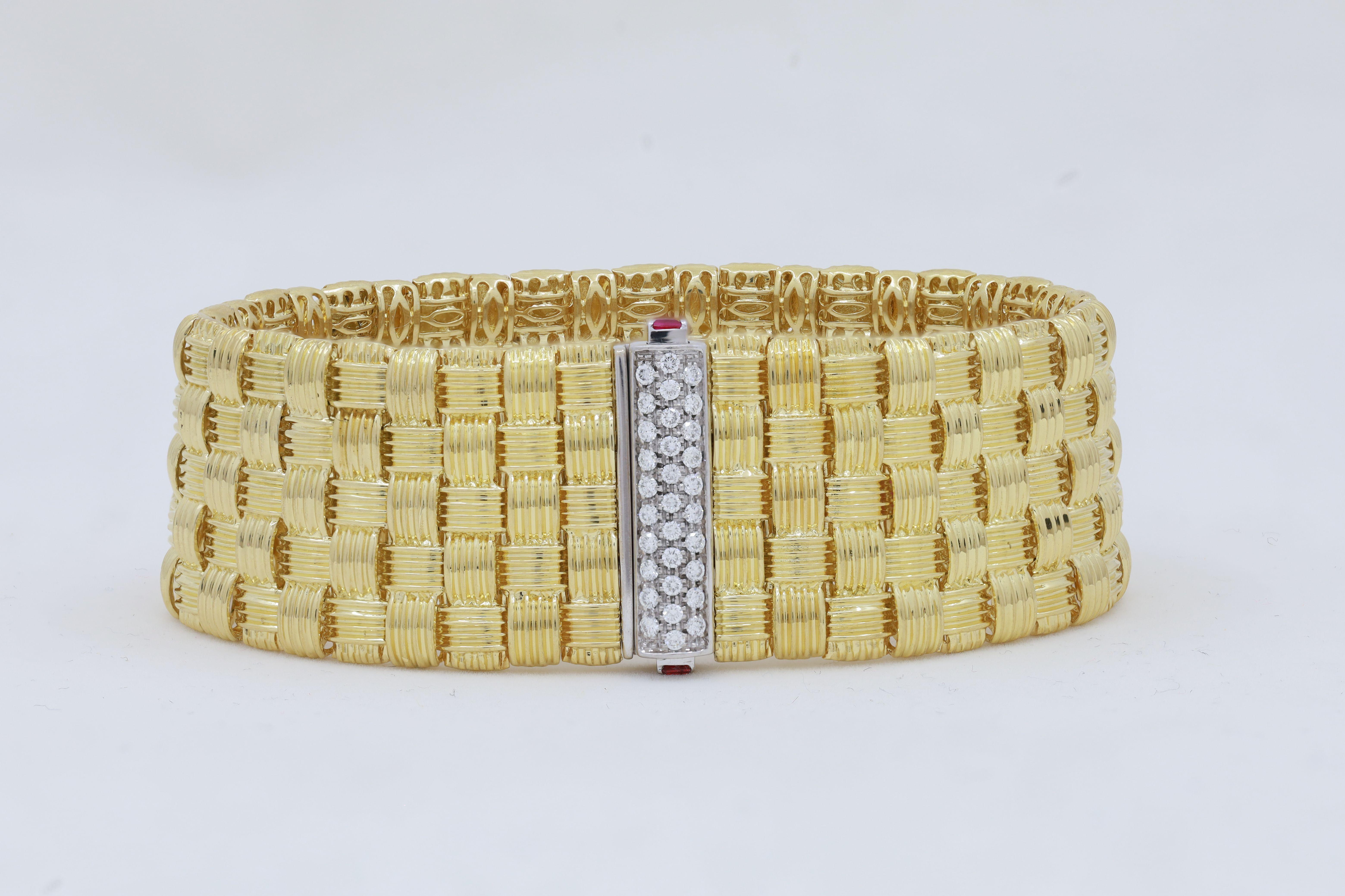 Modern  18KT Roberto coin bracelet woven design with ruby and diamond accent  For Sale