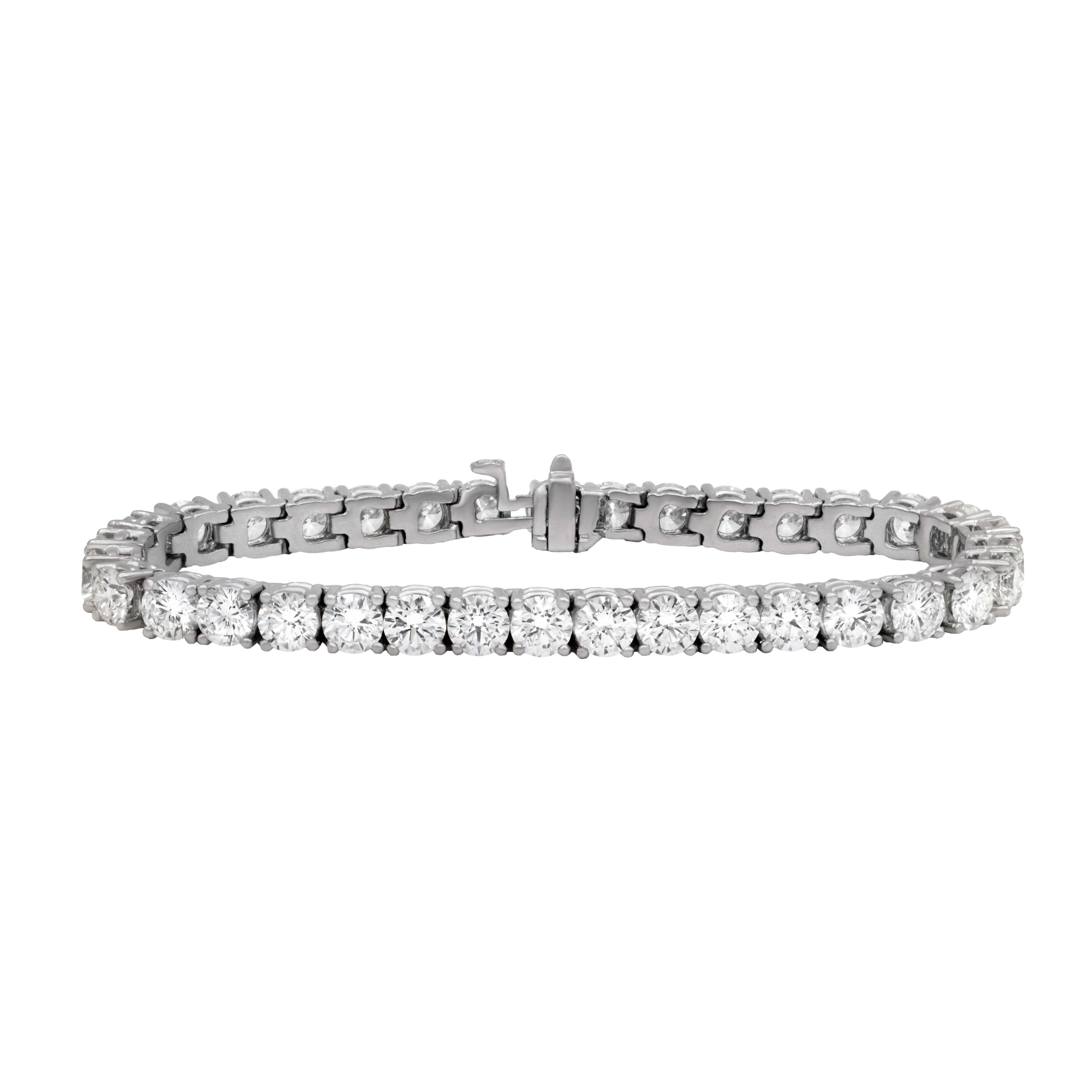 18 kt white gold 4 prong diamond tennis bracelet adorned with 14.36 cts tw of GIA certified round diamonds (F-G color, VS1-VS2 clarity, 35 stones)
Diana M. is a leading supplier of top-quality fine jewelry for over 35 years.
Diana M is one-stop shop