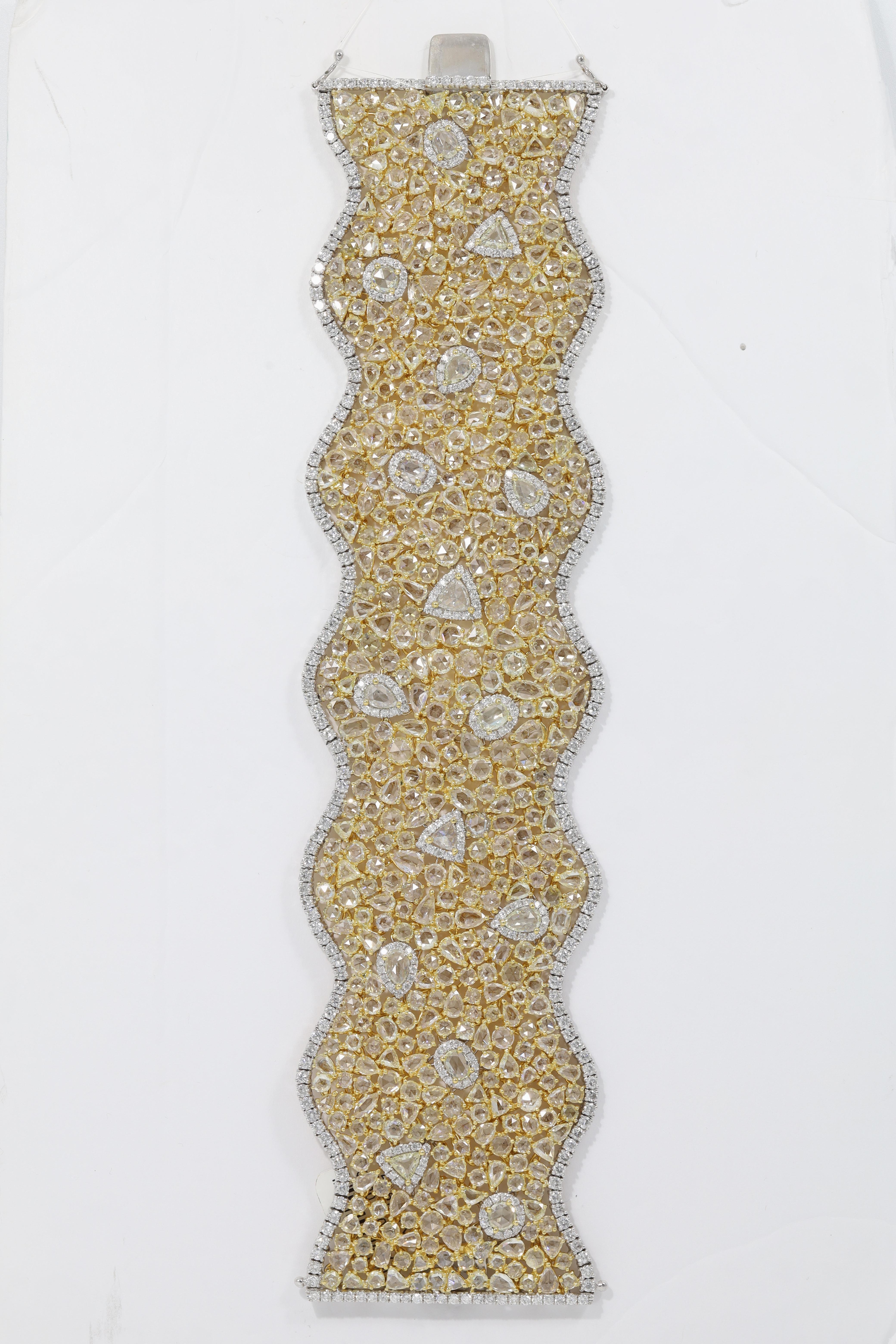 Mixed Cut Diana M. 18kt white and yellow gold bracelet featuring 56.67cts of diamonds  For Sale