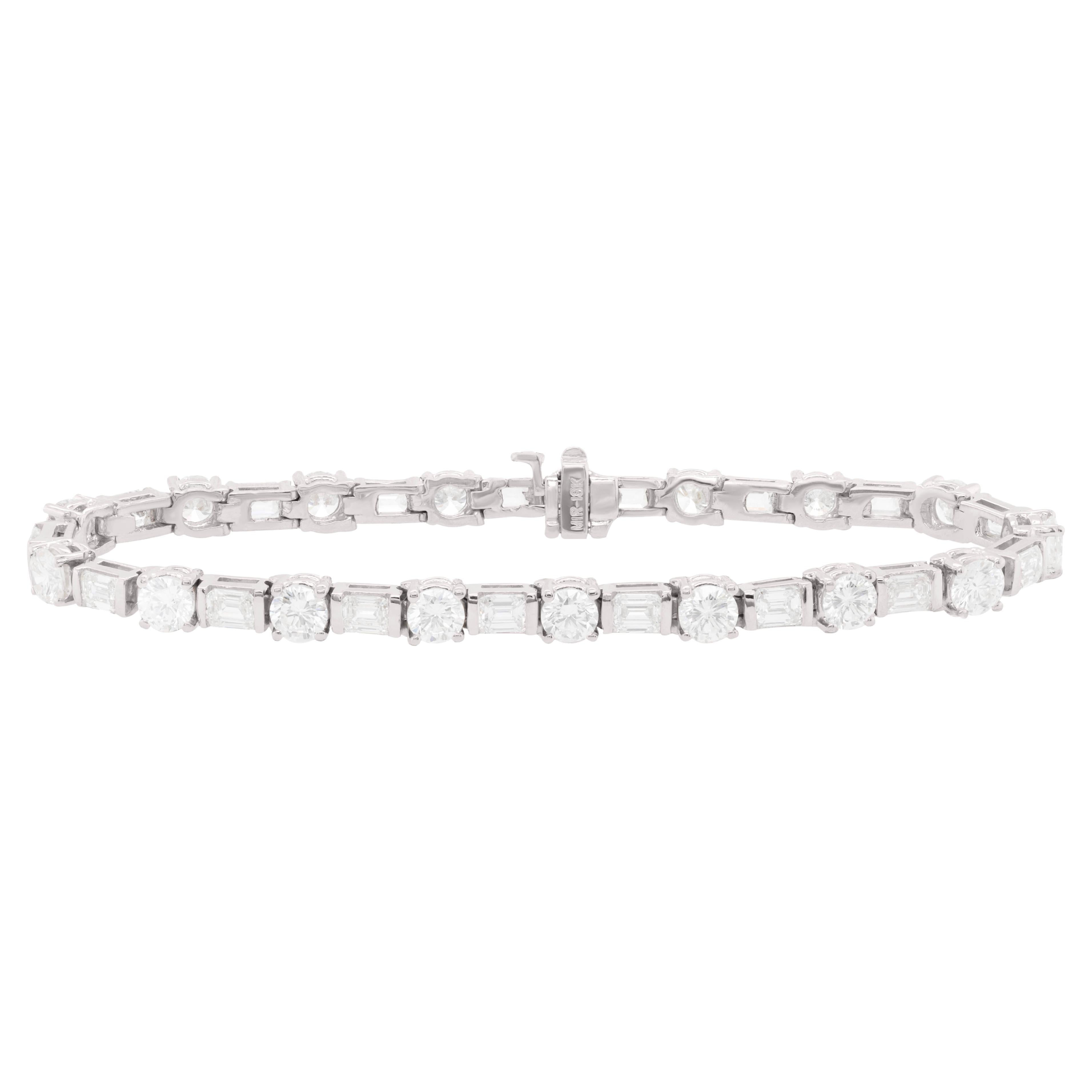 Diana M. 18kt white bracelet 7.00ct baquette and round diamonds 34 stones