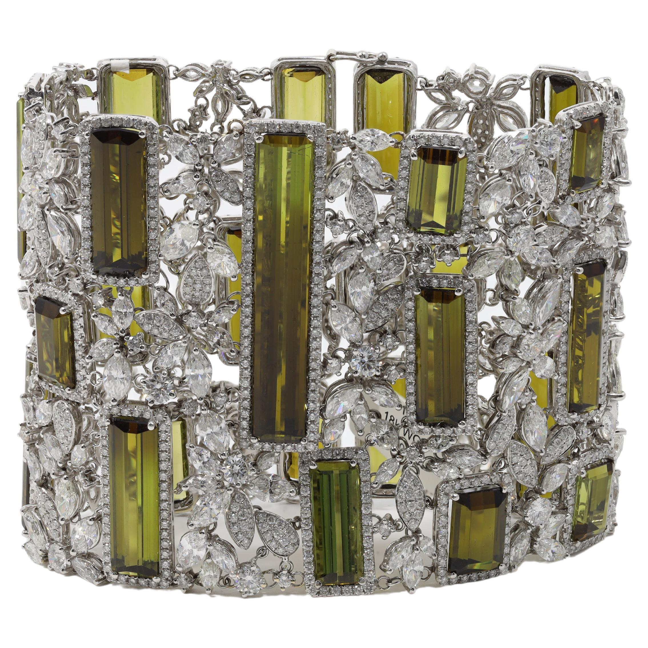 18kt white gold bracelet featuring 131.84 cts of peridot surrounded by marquise and round brilliant cut diamonds

Diana M. is a leading supplier of top-quality fine jewelry for over 35 years.
Diana M is one-stop shop for all your jewelry shopping,