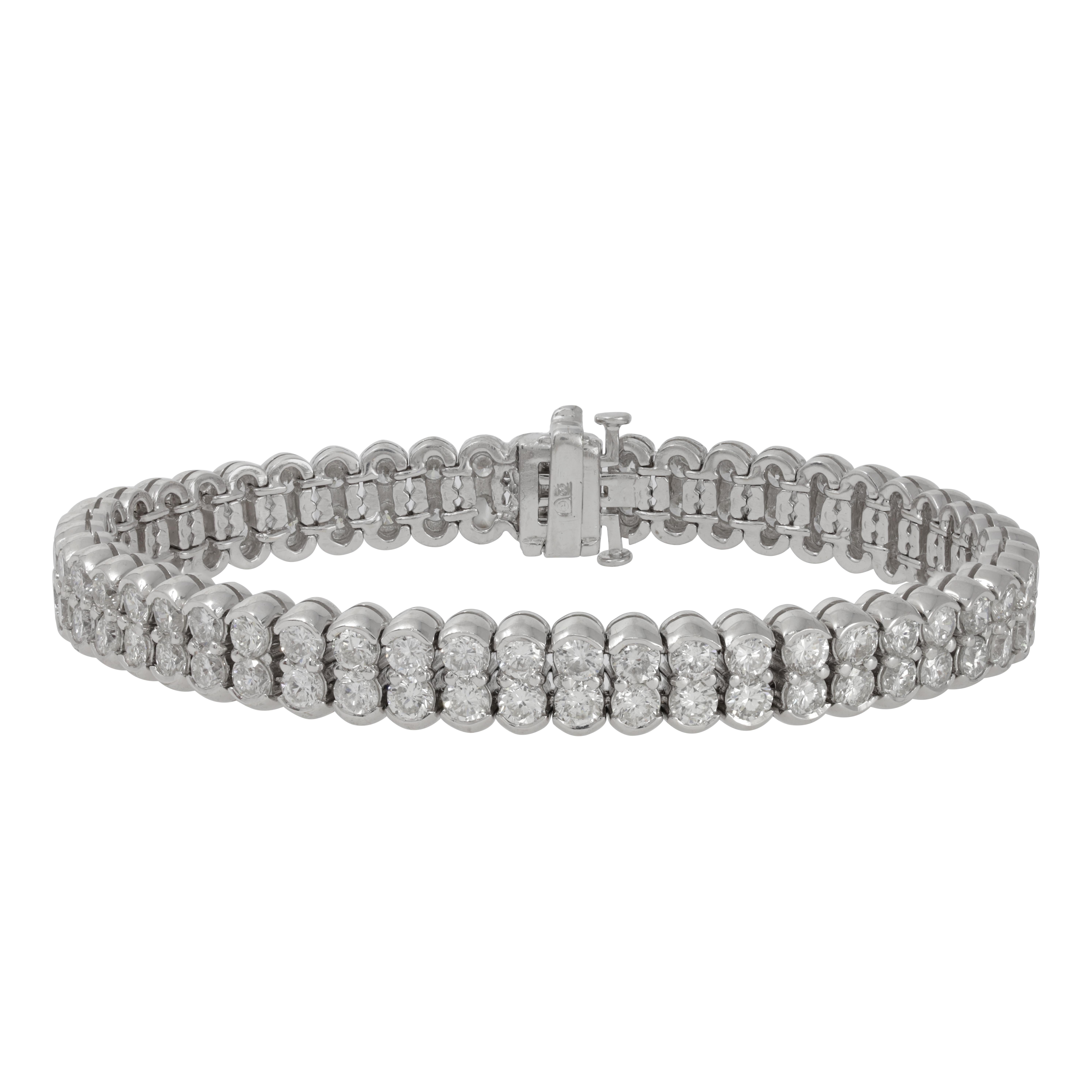 Modern DIANA M. 18kt white gold bracelet featuring 2 rows of 11.70 cts round diamonds For Sale